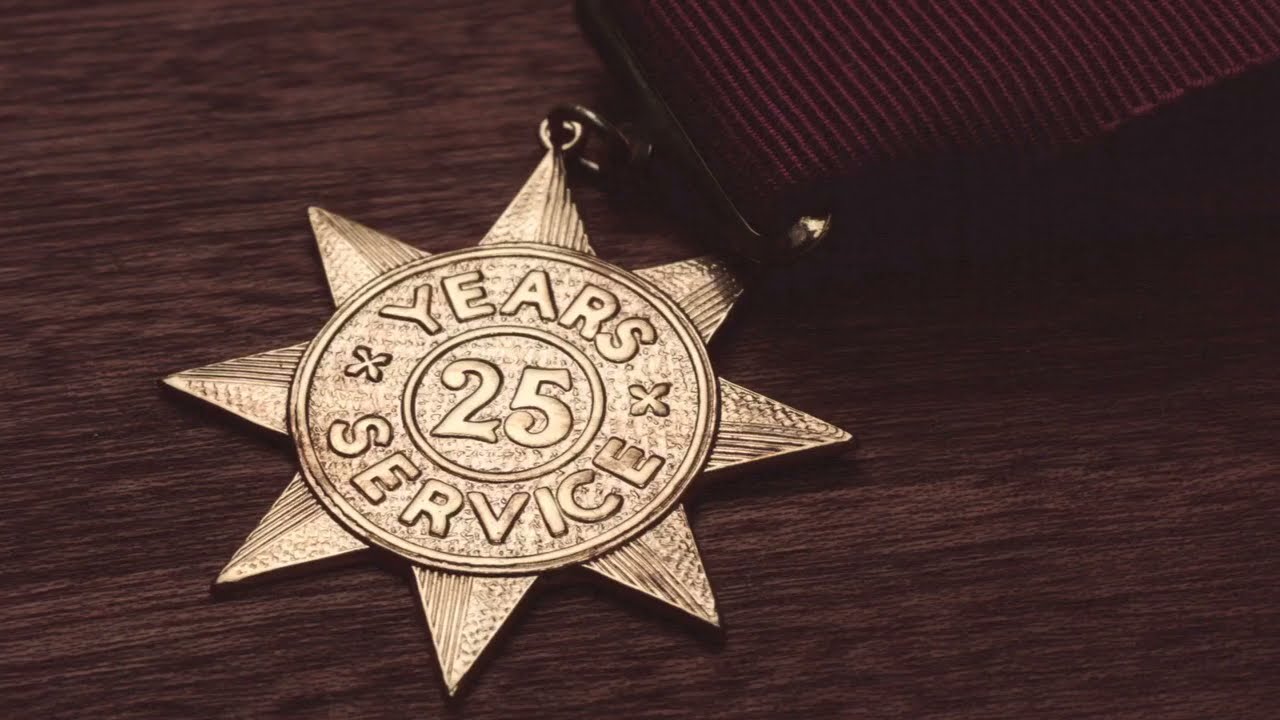 Actual 25-year Gold Star medal